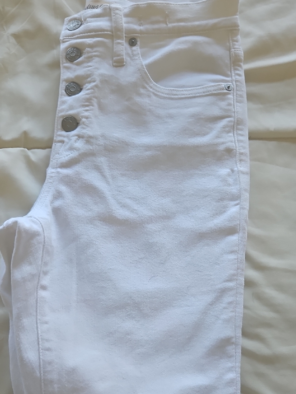 Mid -Rise White Button-Front Skinny Jeans - Picture 7 of 8
